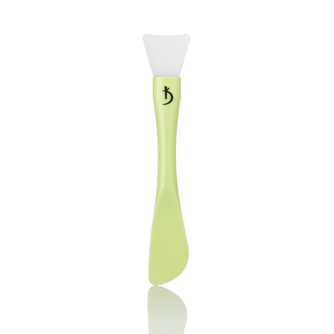 Double-sided plastic brush for applying masks with a silicone tip (color: green)